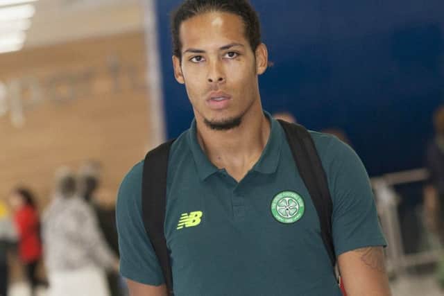 Virgil Van Dijk at Glasgow Airport ahead of his side's UEFA Champions League Third Round Qualifier against FK Qarabag. Picture: SNS