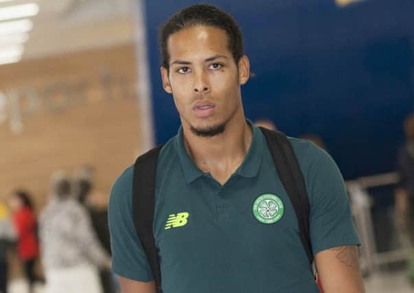 Virgil Van Dijk at Glasgow Airport ahead of his side's UEFA Champions League Third Round Qualifier against FK Qarabag. Picture: SNS