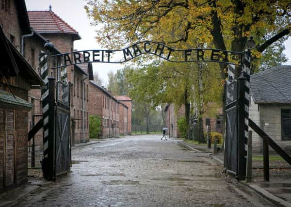 The gates of Auschwitz, where at least 1.1 million prisoners died during the Holocaust. Picture: Contributed