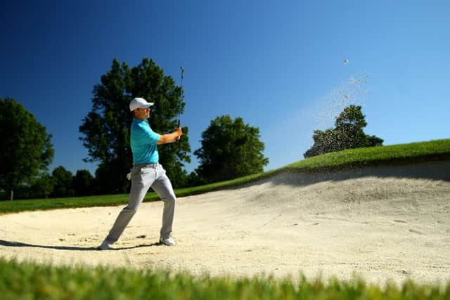 Jordan Spieth plays from a bunker during a practice round for the WGC-Bridgestone Invitational at Firestone Coutry Club. Picture: Getty