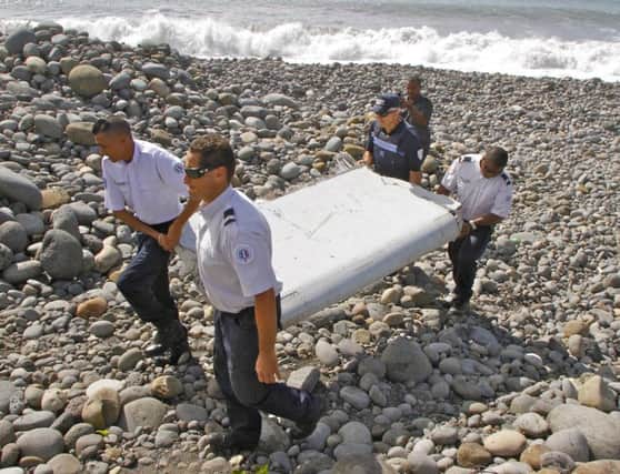 A wing part washed up on the French Indian Ocean island of La Reunion, and has been taken to France to for physical and chemical analysis. Picture: Getty