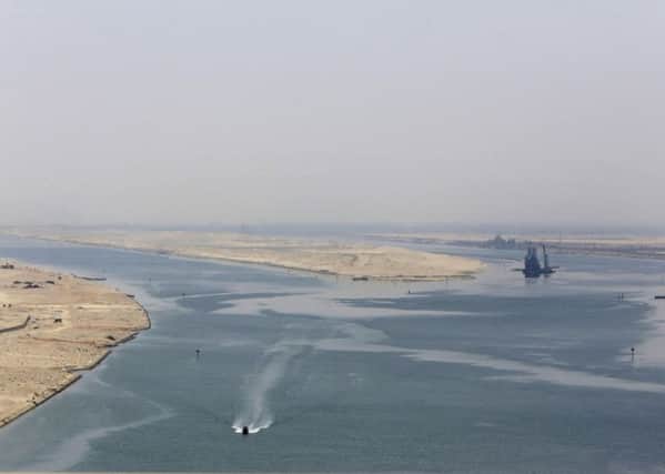 The entrance of the £5.5 billion new section of the Suez Canal in Egypt, which was unveiled yesterday by president Abdel-Fattah el-Sissi who had ordered it completed in a year. Picture: AP