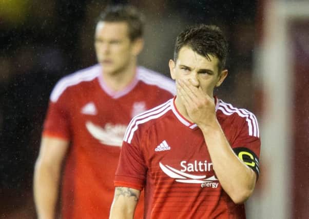 Aberdeen's Ryan Jack looks dejected at end of the Europa League Third Qualifying Round Second Leg match at Pittodrie. Picture: PA