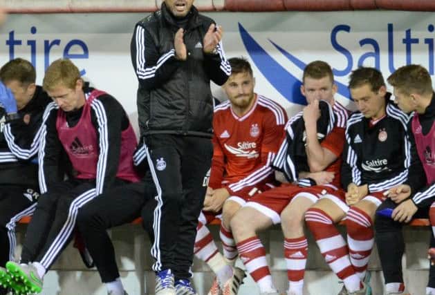 Aberdeen Manager Derek McInnes hailed players after their defeat to Kairat Almaty. Picture: Rob Casey