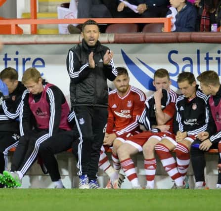 Aberdeen Manager Derek McInnes hailed players after their defeat to Kairat Almaty. Picture: Rob Casey