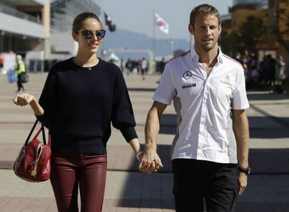 Grand Prix driver Jenson Button and his wife Jessica were gassed in their sleep by burglars. Picture: AP