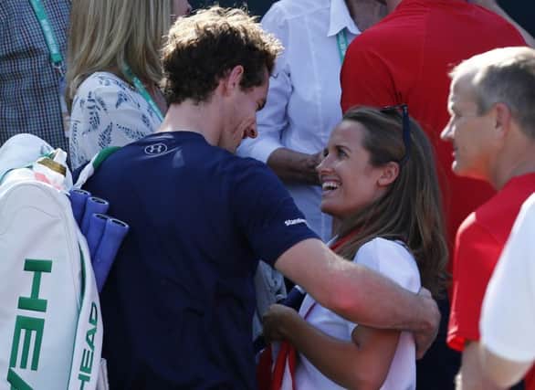 Andy Murray will soon have more than his sports bags to carry  as will Kim. Picture: Getty