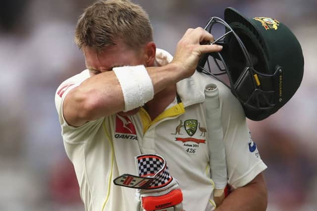 David Warner trudges off after being dismissed by Stokes. Picture: Getty