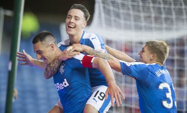 Rangers' Lee Wallace (left) celebrates scoring his side's first goal. Picture: PA