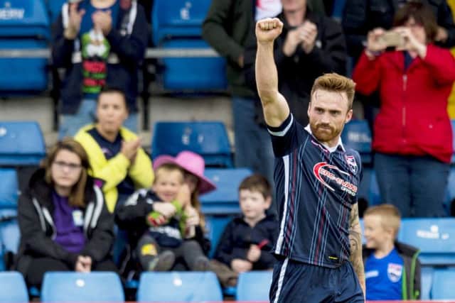 Craig Curran Celebrates his second goal for Ross County. Picture: SNS