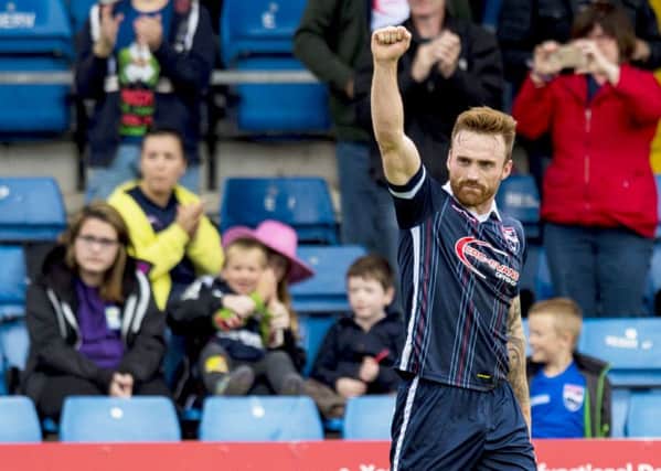 Craig Curran Celebrates his second goal for Ross County. Picture: SNS