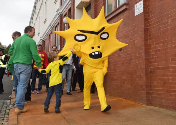 Partick Thistle mascot Kingsley greets fans at Firhill. Picture: SNS