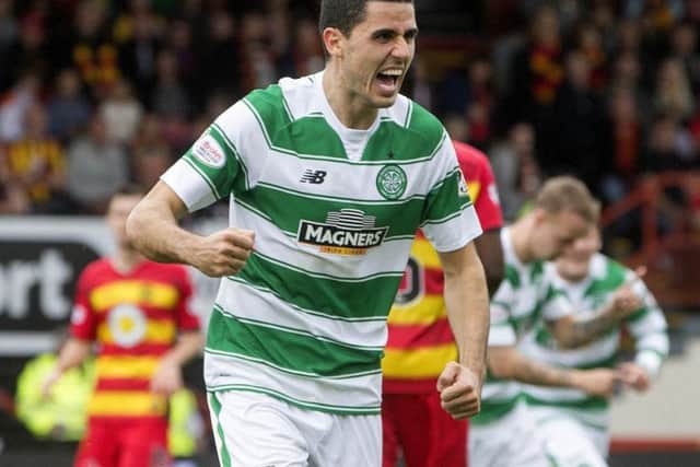 Celtics Tom Rogic, who missed much of 2014 after being sidelined with a groin injury, celebrates his goal at Firhill. Picture: Jeff Holmes/PA