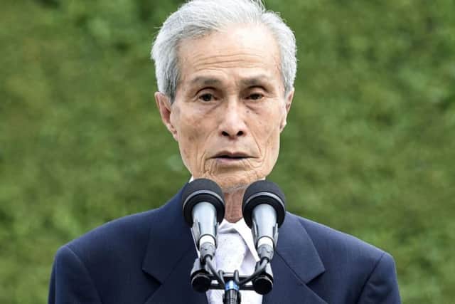 Survivor Sumiteru Taniguchi addresses people gathered at the Peace Park in Nagasaki. Picture: AP