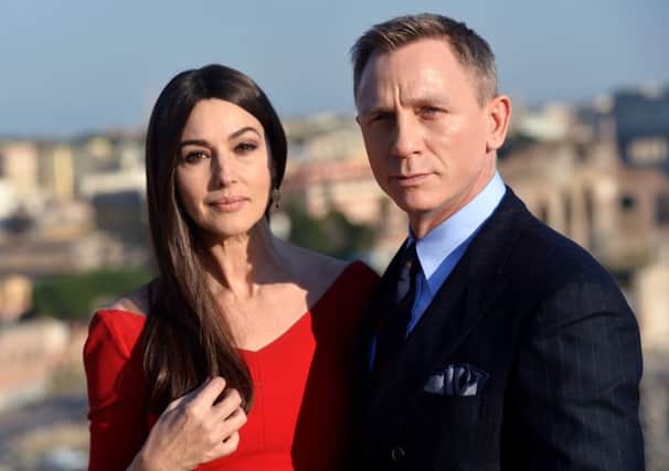 Daniel Craig is set to return as James Bond in Spectre, co-starring Monica Bellucci, providing a lift for Cineworld. Picture: Getty