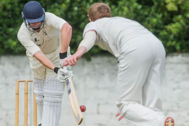 Granges John Blain defends a delivery from Carltons Alasdair Evans at Raeburn Place. Picture: Ian Georgeson