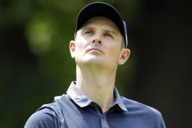 Justin Roses three birdies over the last four holes included a 40-foot putt at the 18th. Picture: AP