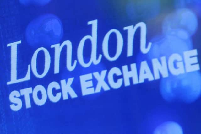 The FTSE 100 rose despite the grocery hit. Picture: AP Photo/ Alastair Grant