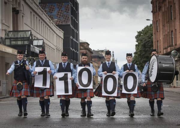 The New Zealand Police Pipe Band, from left to right: piper Emmett Conway, Graeme Bilsand, Ian Robertson, Grace Foster, Keyyn Johnstone, Angus Crowe and bass drummer Dale Stephens. Picture: PA