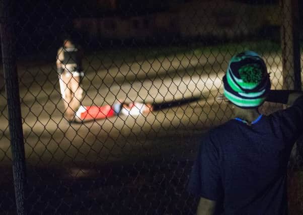 The protester lies on the road after being shot by police at a demonstration in the city of Ferguson, Missouri, on Sunday night. Picture: Getty