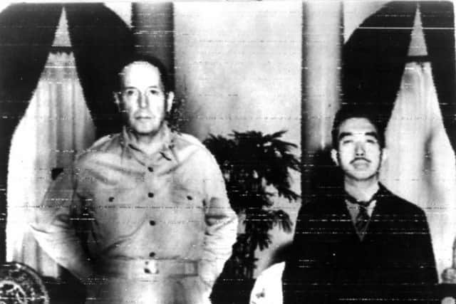 Hirohito with General MacArthur who was charged with rebuilding Japan. Picture: Getty