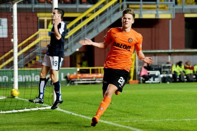 Blair Spittal wheels away after scoring his second. Picture: SNS