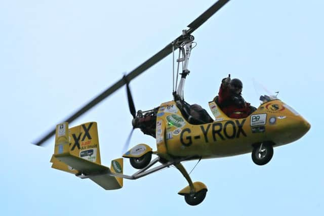 Northern Ireland adventurer Norman Surplus completed a record flight around the world in gyrocopter. Picture: PA