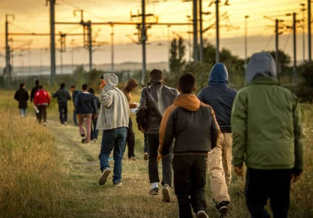 Migrants arriving in Calais have been the focus of press coverage over the summer, but the solution to the problem requires calm consideration. Picture: Getty