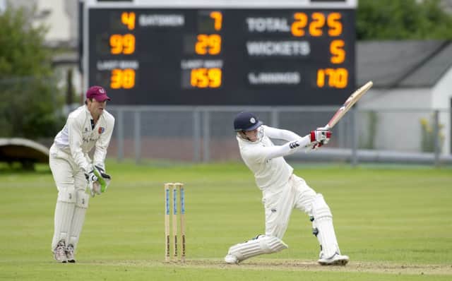 Michael Leask smashes the ball to the boundary to bring up his hundred at Titwood. Picture: Donald MacLeod