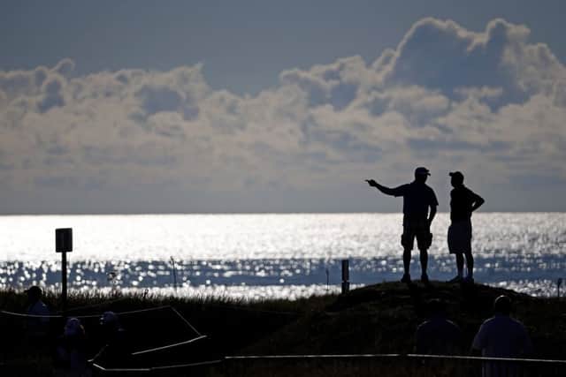 Fans look over the stunning second hole for the US PGA Championship at Whistling Straits, Wisconsin, yesterday. Picture: Julio Corte/ AP Photo