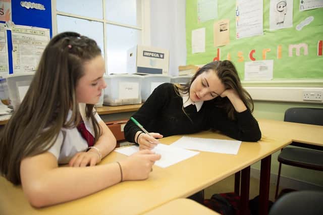 Research found there was 245 hours difference in the number of hours secondary pupils spent at school depending on where they lived. Picture: John Devlin