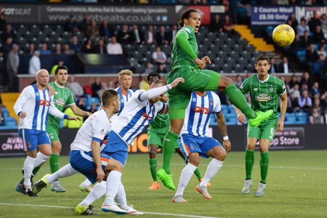 Celtic's Virgil Van Dijk (2nd from right) causes problems in the Kilmarnock box. Picture: SNS