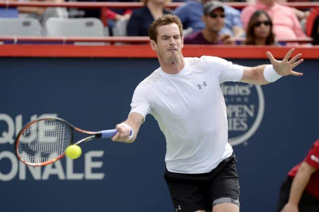 Andy Murray hits a forehand return to Gilles Muller during the Scots 63, 62 win in Montreal last night.  Picture: Paul Chiasson/The Canadian Press