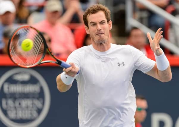 Andy Murray breezed into the quarter finals but lost out to brother Jamie in the doubles. Picture: Getty
