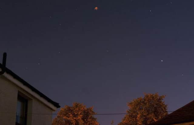 Does this image show a UFO in the skies above Glasgow? Picture: Stuart Noble
