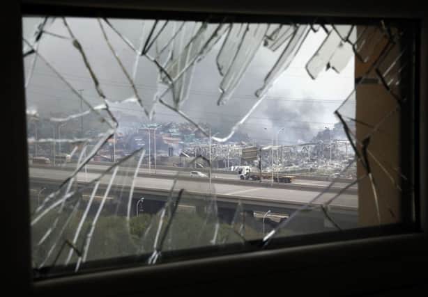A window shattered in Wednesday's blast at the Chinese port city of Tianjin. Picture: AP
