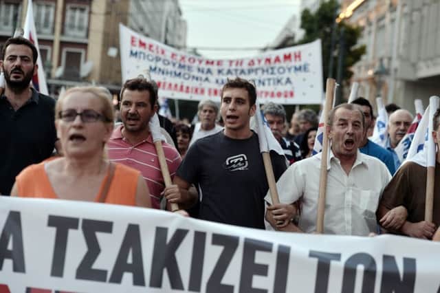 Protesters march in central Athens during a demonstration against the bailout agreement. Picture: Getty