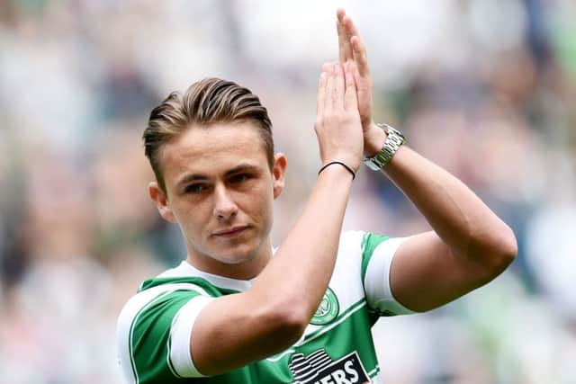 New Celtic signing Scott Allan applauds the home support. Picture: SNS