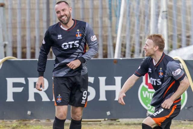 Kris Boyd is all smiles after heading home Kilmarnock's late equaliser. Picture: SNS