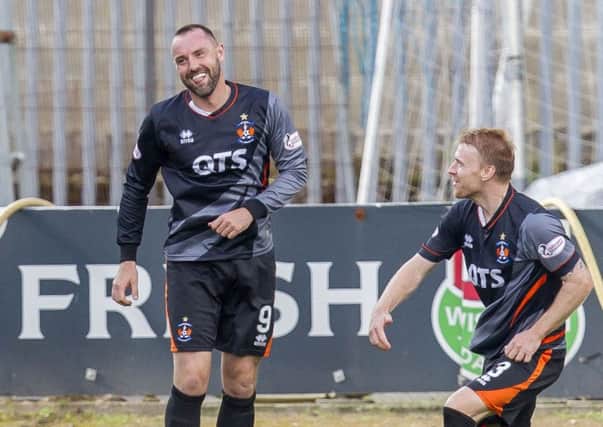 Kris Boyd is all smiles after heading home Kilmarnock's late equaliser. Picture: SNS