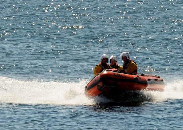A helicopter and 11 vessels are searching for the man who fell overboard from a boat off the Aberdeen coast. Picture: Lisa Ferguson