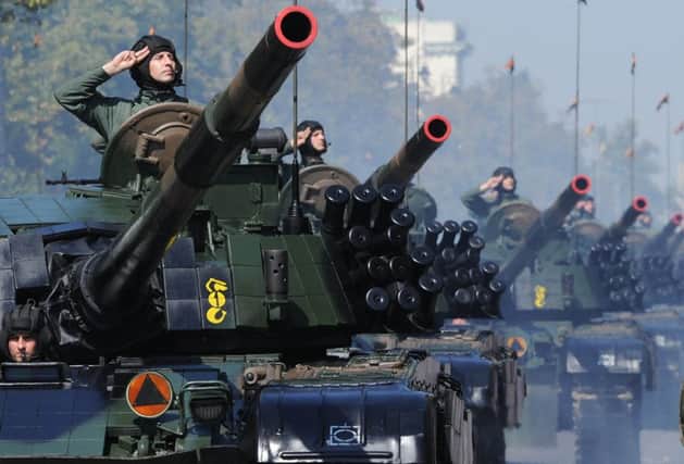 Polish troops show off their armour at the weekend. The country may have to fight alone for days in the event of Russian aggression. Picture: AP