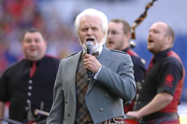 Ronnie Browne sings Flower of Scotland in 2010. He has vowed never to perform the song again because the thought of his late wife makes him too emotional. Picture: Robert Perry