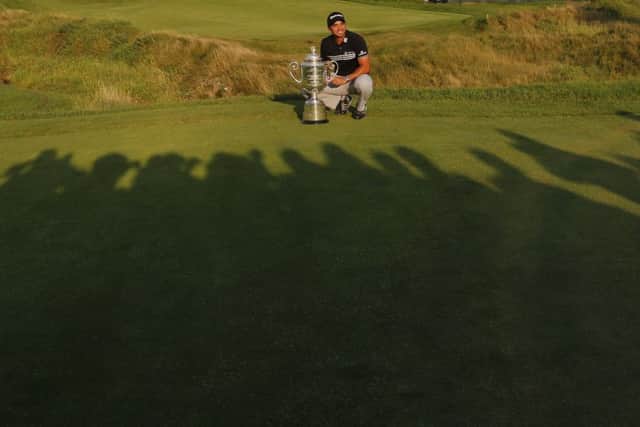Jason Day with the trophy. Picture: AP