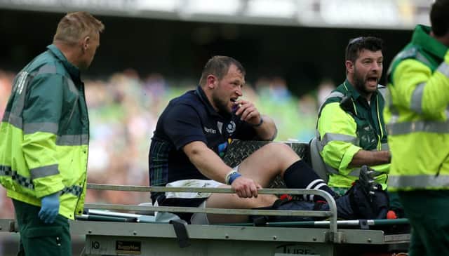 Scotland loosehead prop Ryan Grant is carried off on a stretcher, sparking fears for his participation in the Rugby World Cup. Picture: PA