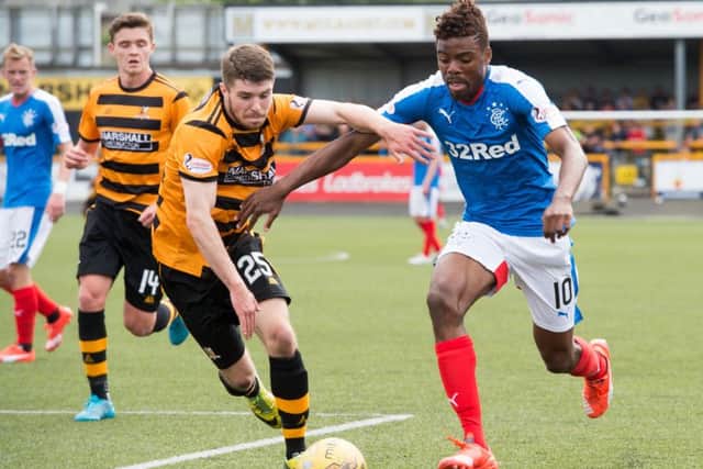 Rangers' Nathan Oduwa (right) tussles with Alloa's Aron Lynas. Picture: SNS