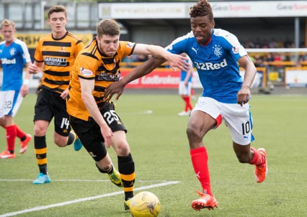 Rangers' Nathan Oduwa (right) tussles with Alloa's Aron Lynas. Picture: SNS