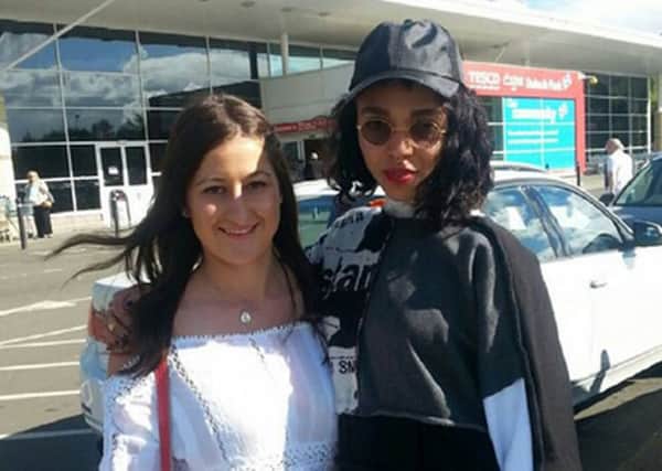Megan Philp poses with pop star FKA Twigs outside a Tesco in Dunfermline. Picture: Instagram