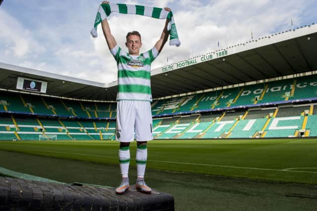 Scott Allan in his new colours at Celtic Park yesterday. Picture: SNS