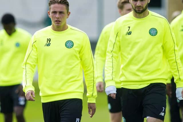 Nadir Ciftci, right, with new team-mate Scott Allan in training. Picture: SNS